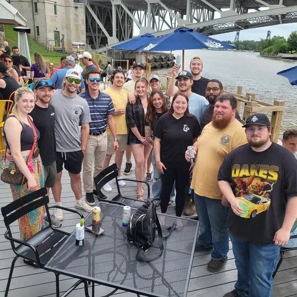 Friends on the deck under the bridge